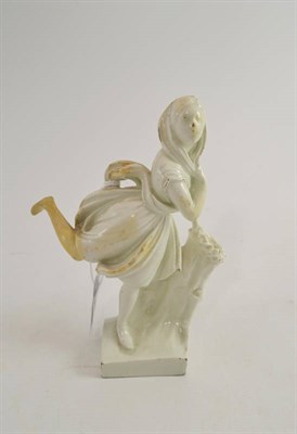 Lot 570 - A Continental creamware figure of a dancer, possibly German, early 19th century, in scarf and dress