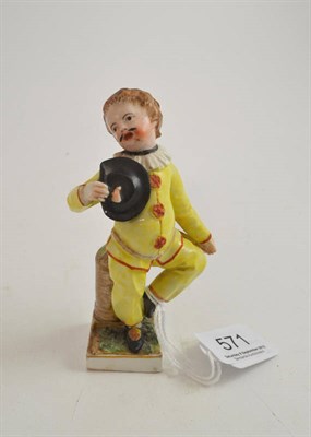 Lot 571 - A Frankenthal porcelain figure of Pierrot, 1783, standing on one leg wearing a yellow costume...