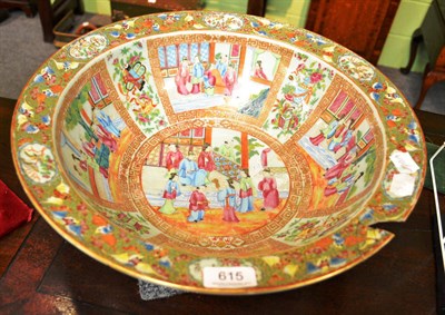 Lot 615 - A large Canton famille rose export punch bowl, riveted