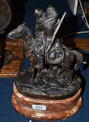 Lot 624 - A Russian style bronze group of a Cossack on horseback holding his wife, on an oval base, 23cm...