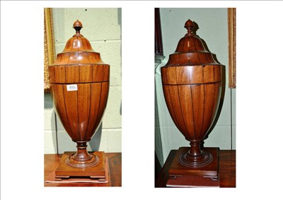 Lot 633 - A pair of George III style mahogany and boxwood strung knife boxes of classical urn shape