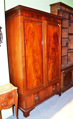 Lot 648 - A George III style mahogany double door wardrobe