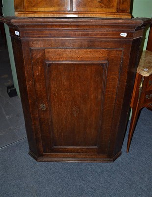 Lot 652 - 18th century oak hanging corner cupboard