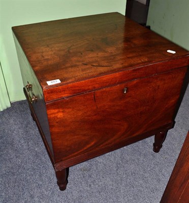 Lot 653 - A 19th century mahogany hinged box, raised on four turned legs