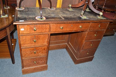 Lot 657 - A late 19th century oak desk