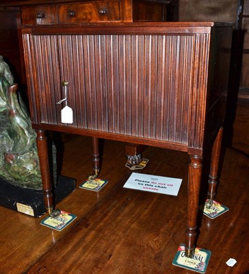 Lot 660 - A mahogany tambour fronted pot cupboard