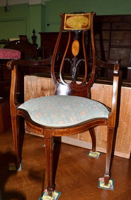 Lot 672 - An Edwardian inlaid mahogany corner chair