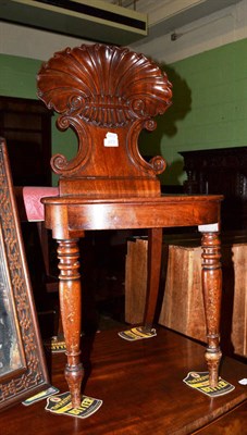 Lot 673 - Early 19th century hall chair with shell carved back