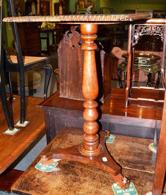 Lot 680 - A late 19th century mahogany tripod table