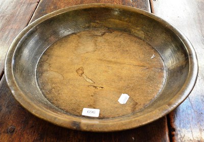 Lot 696 - A sycamore dairy bowl