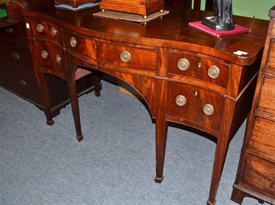 Lot 700 - A 19th century Serpentine sideboard