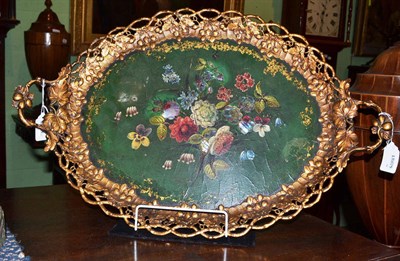 Lot 704 - A papier mache tray with ormolu border