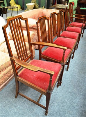 Lot 707 - A set of six Edwardian mahogany and satinwood banded dining chairs, including two carvers