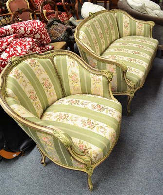 Lot 715 - Louis XV style painted small sofa and matching armchair with green stripe upholstery