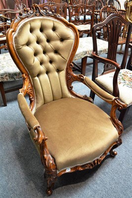 Lot 725 - A Victorian walnut framed open armchair