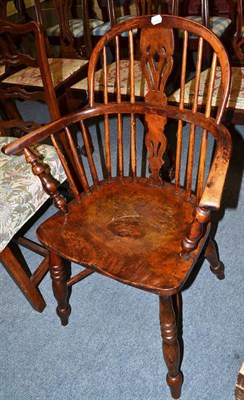 Lot 727 - A 19th century yew wood Windsor armchair