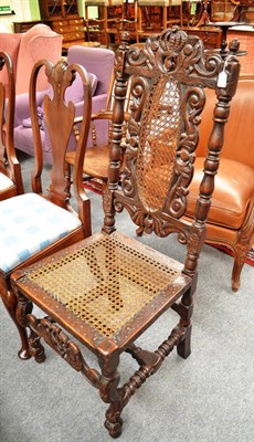 Lot 731 - A carved walnut cane-seated high back chair, in 17th century style