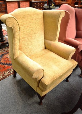 Lot 733 - Modern wingback armchair