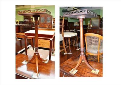 Lot 752 - Pair of mahogany tripod tables with fret work gallery