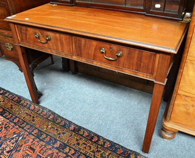 Lot 771 - A mahogany writing table