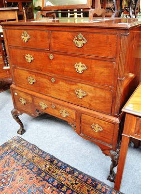 Lot 773 - An 18th century mahogany chest on stand (alterations)