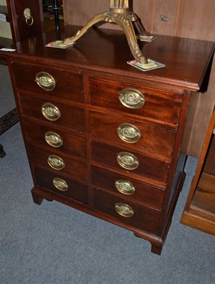 Lot 781 - A small mahogany chest fitted with ten drawers (altered)