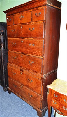 Lot 804 - An 18th century oak chest on chest