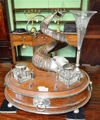 Lot 826 - A rams horn inkwell desk stand