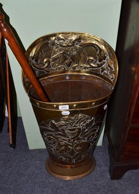 Lot 843 - A brass grape hood stick stand and a copper and brass bed warming pan