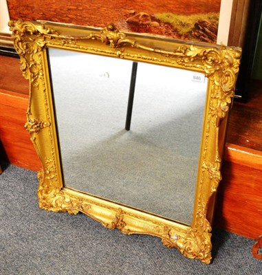 Lot 846 - A gilt and gesso wall mirror