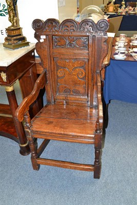 Lot 847 - A carved oak Wainscott armchair