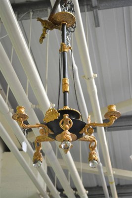 Lot 852 - Bronze and gilt three light chandelier in Regency style, with suspension hook