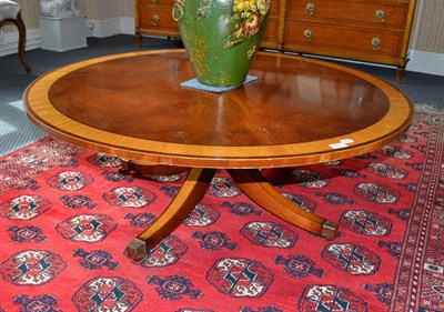 Lot 858 - A reproduction mahogany satinwood banded coffee table