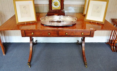 Lot 861 - A late George III inlaid sofa table