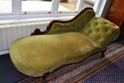 Lot 880 - A Victorian walnut framed chaise longue