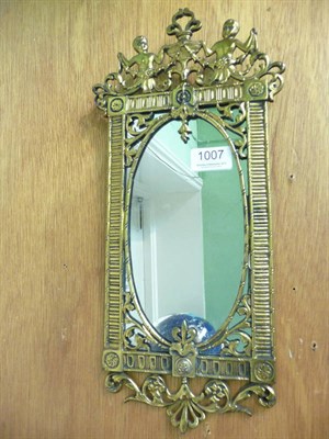 Lot 1007 - A 19th century brass mirror with shipping line connections