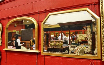 Lot 1080 - Two gilt framed overmantel mirrors, a print of Durham cathedral and a large decorative print of...