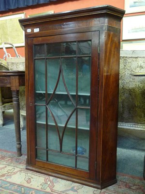 Lot 1090 - Georgian glazed mahogany corner cupboard