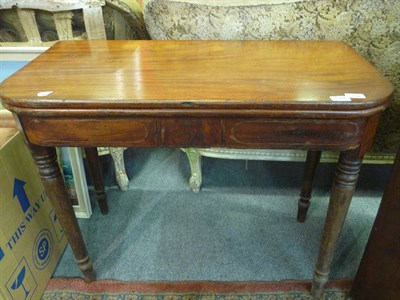 Lot 1092 - A late George III mahogany foldover card table