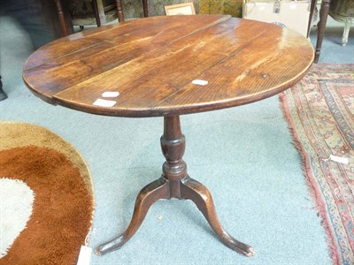 Lot 1100 - Georgian oak tripod table