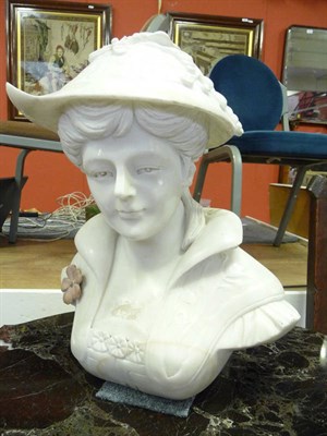 Lot 1109 - Marble bust of a maiden in a bonnet (a.f.)