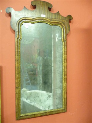 Lot 1111 - A Georgian parcel gilt mirror