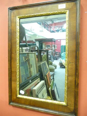 Lot 1113 - An 18th century walnut parcel gilt mirror