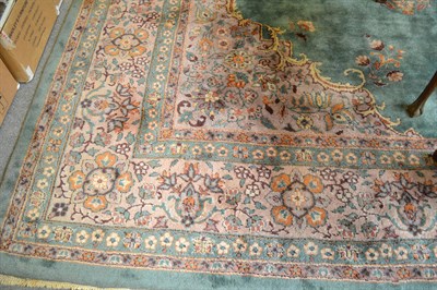 Lot 1123 - Isparta carpet Central Anatolia, The apple green field with central medallion enclosed by...