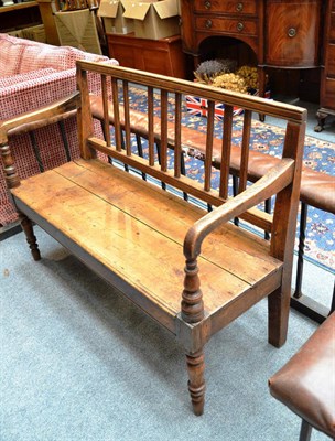 Lot 1141 - A country elm and ash bench