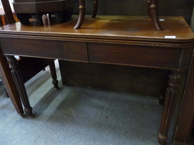 Lot 1146 - Georgian mahogany fold over tea table