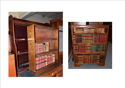 Lot 1155 - A reproduction yew wood bookcase and two free standing bookcases