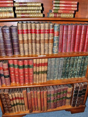 Lot 1156 - A quantity of leather bound books on six shelves