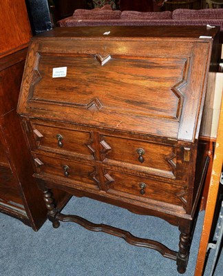 Lot 1163 - A 1930s oak bureau