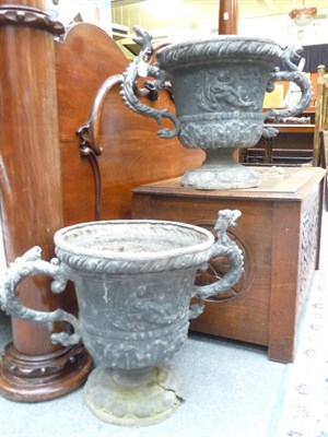 Lot 1167 - Pair of lead urns (one damaged)